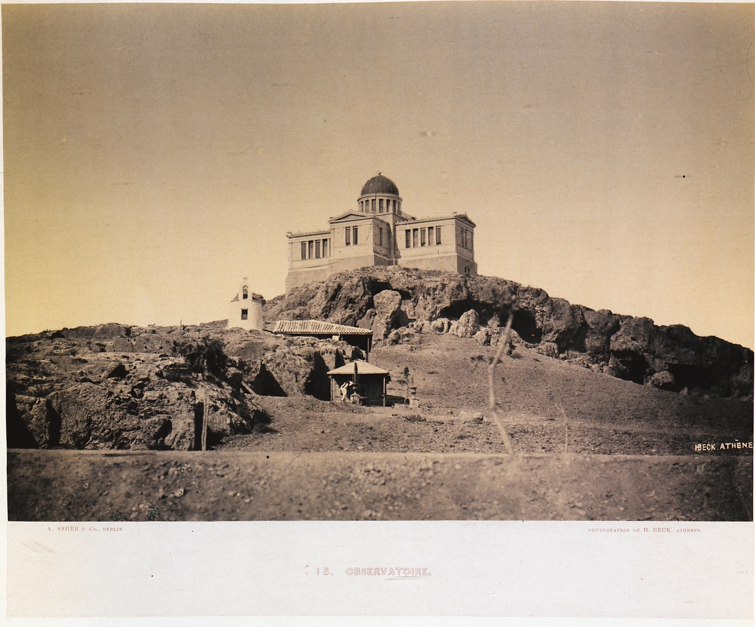 The ancient caves underneath the Obsevatory; to the front, the little church of Agia Marina and further down a fountain (The Gennadius Library - American School of Classical Studies at Athens, from the website of the Aikaterini Laskaridi Foundation).